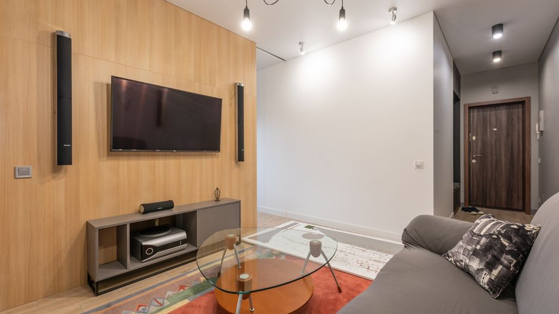 smart home living room with adaptive lighting and