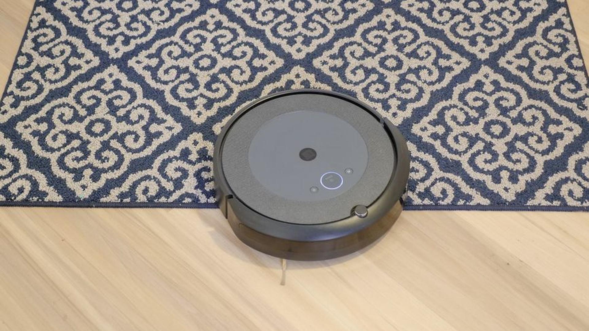robot vacuum cleaning floor messy rug $199 smart