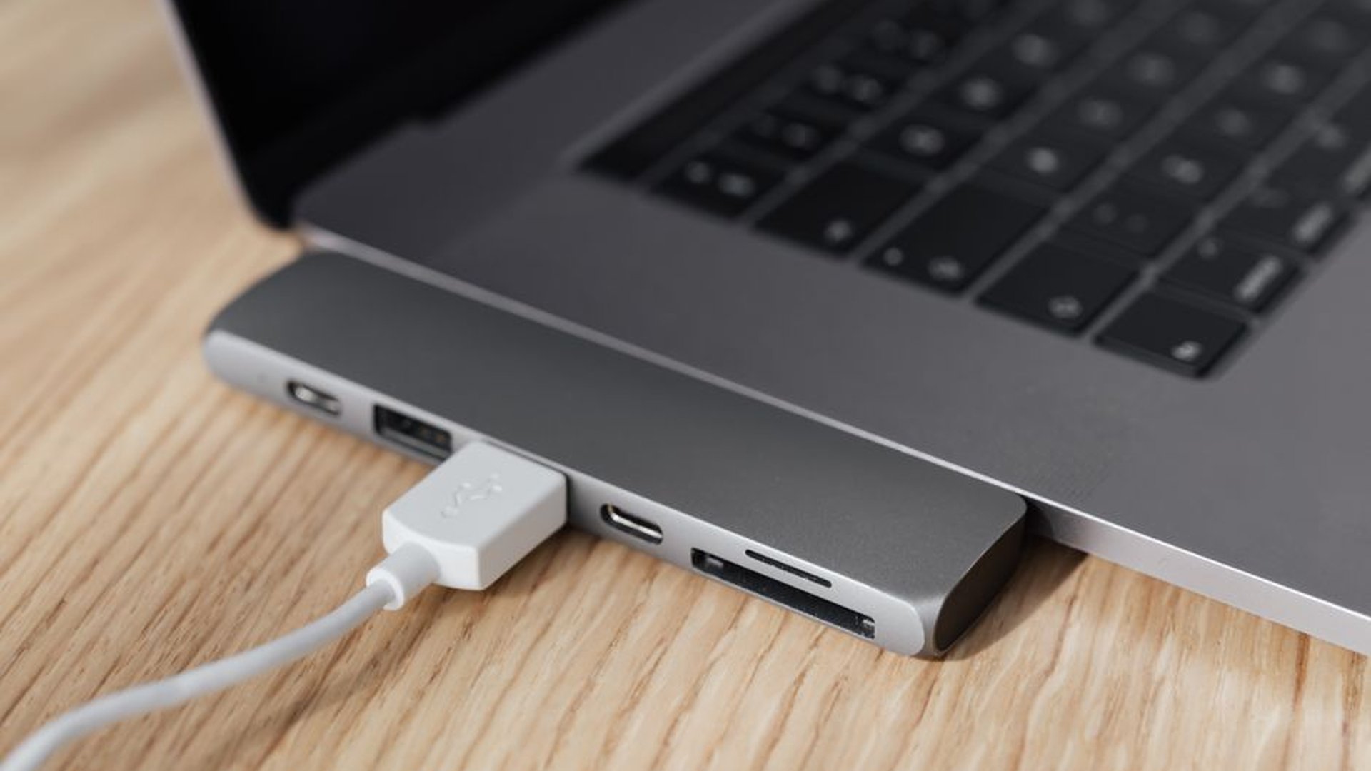smart hub USB-C desktop setup AI processing laptop